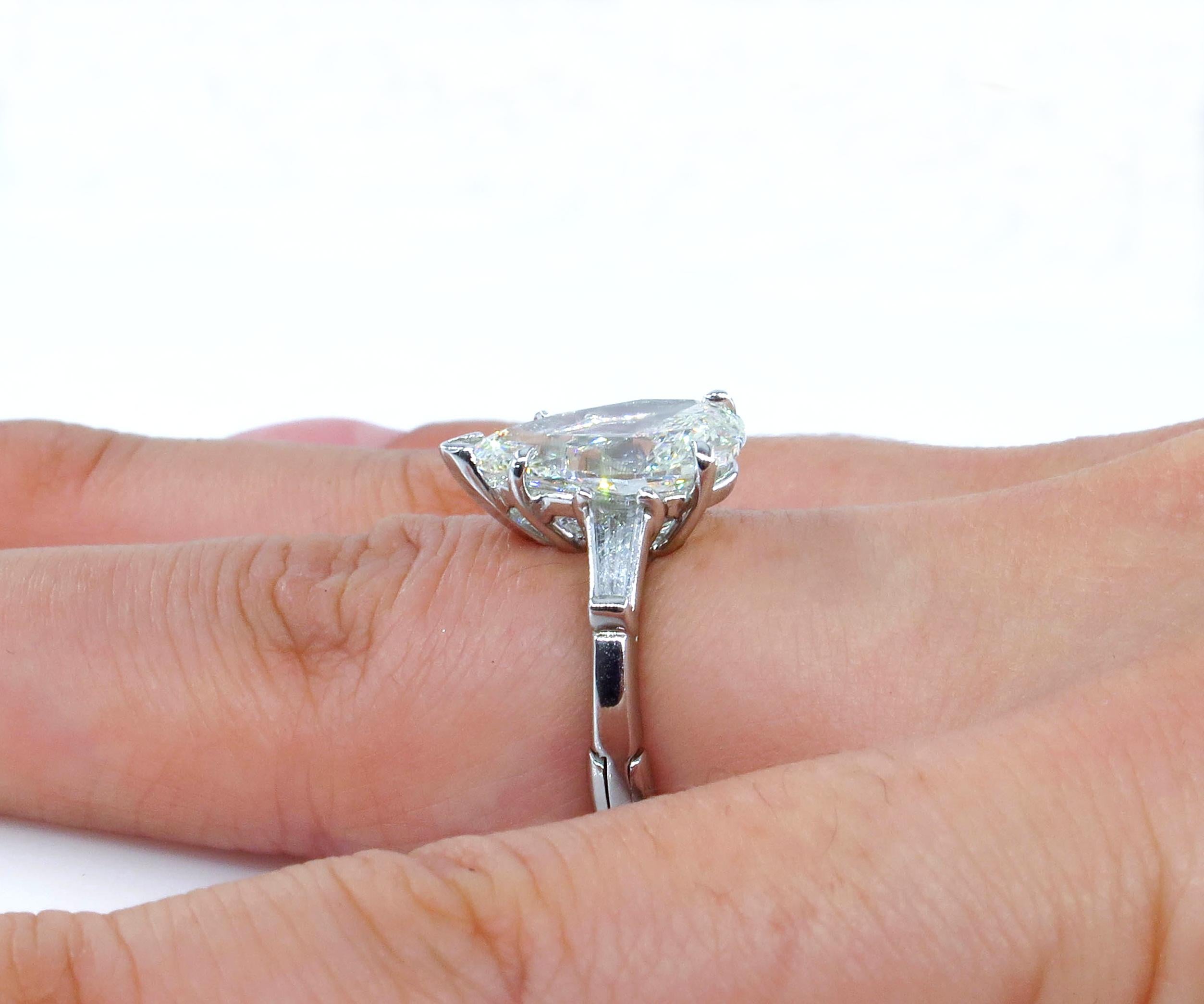 GIA 4.51 Carat Estate Vintage Pear Shaped Three-Stone Diamond Ring 9