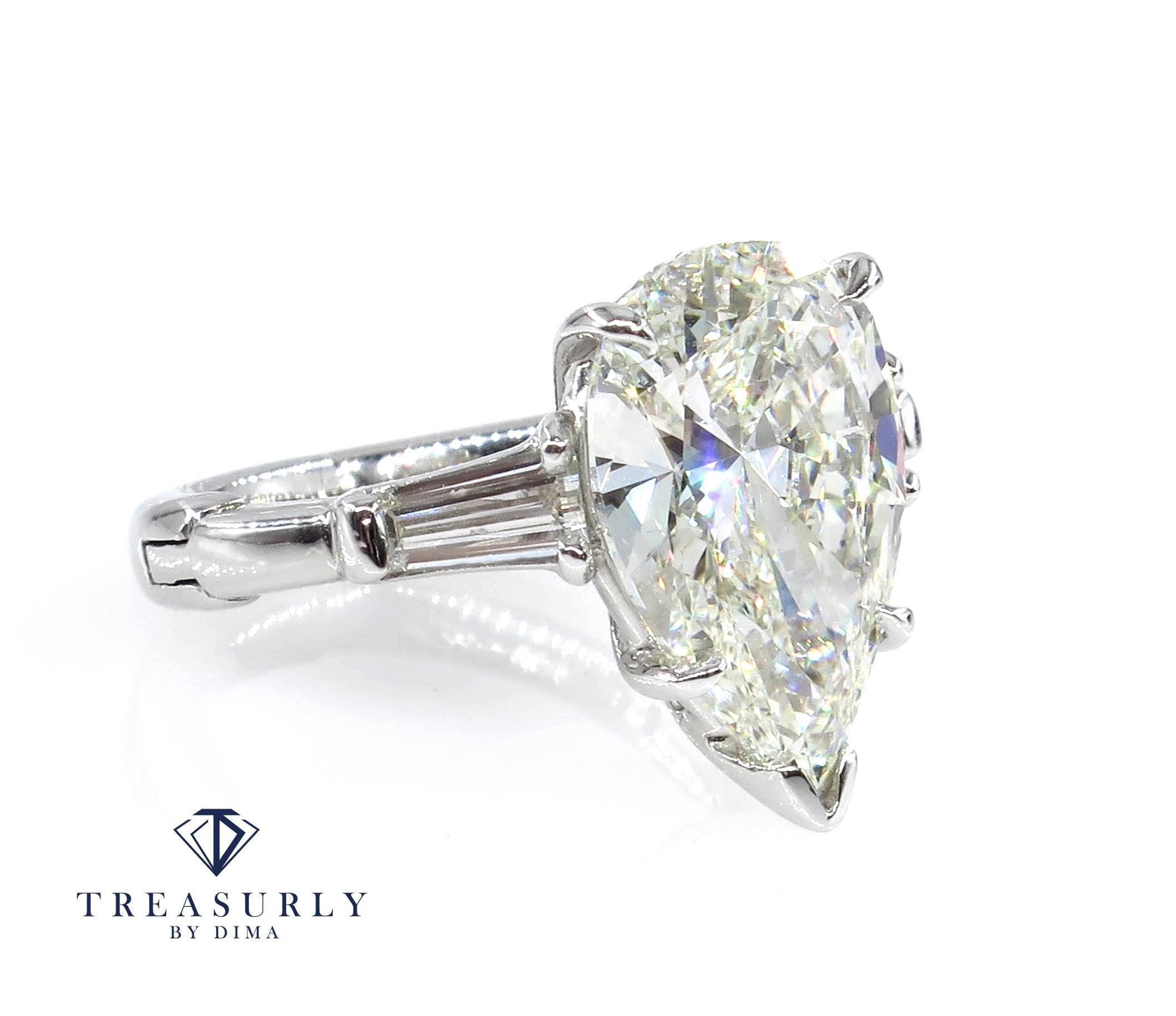 Women's or Men's GIA 4.51 Carat Estate Vintage Pear Shaped Three-Stone Diamond Ring