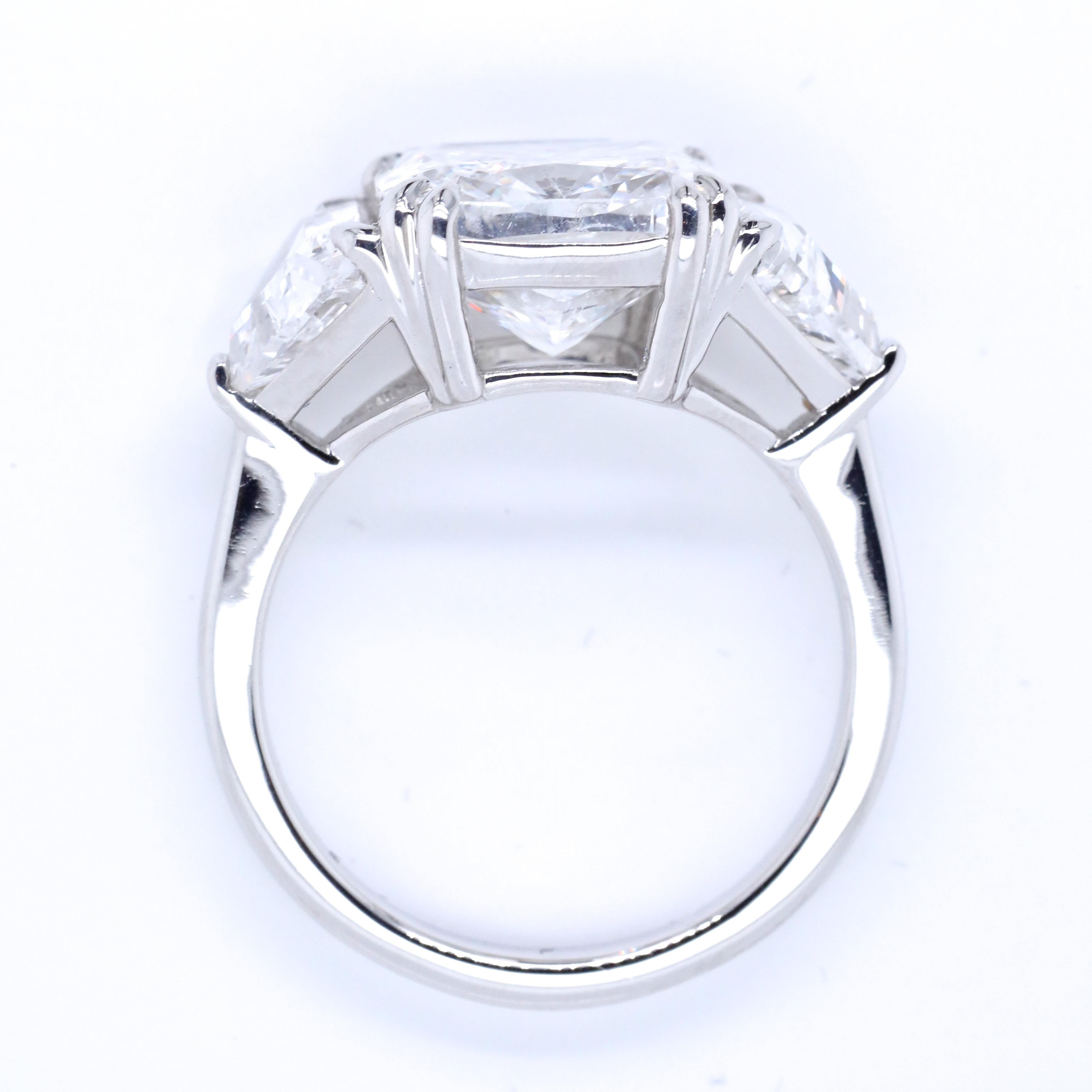 Modern GIA 4.54 Carat Cushion Cut Diamond Three-Stone Platinum Engagement Ring