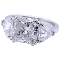 GIA 4.54 Carat Cushion Cut Diamond Three-Stone Platinum Engagement Ring