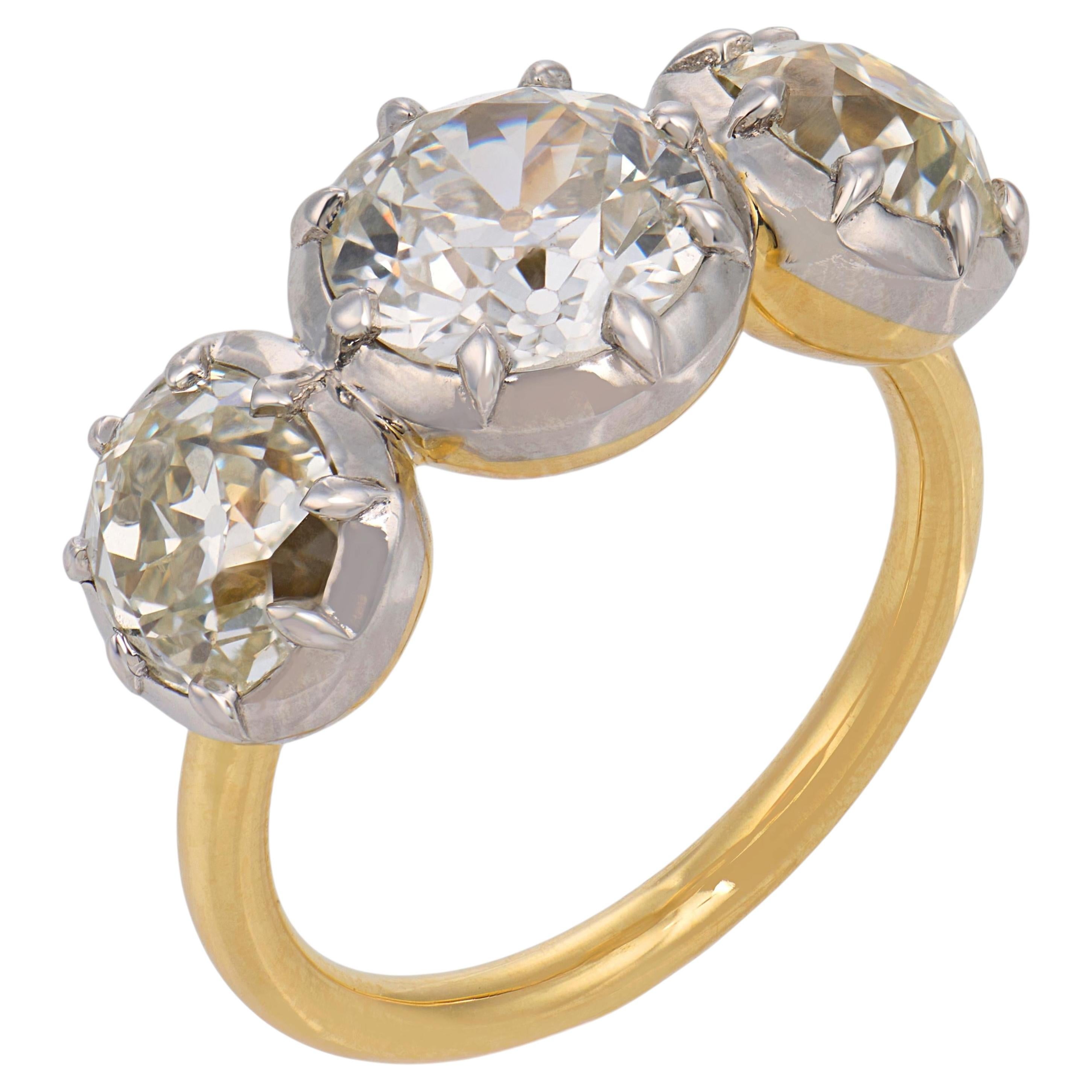 GIA 4.58 carat old cut diamond 18k yellow gold colette set three stone ring