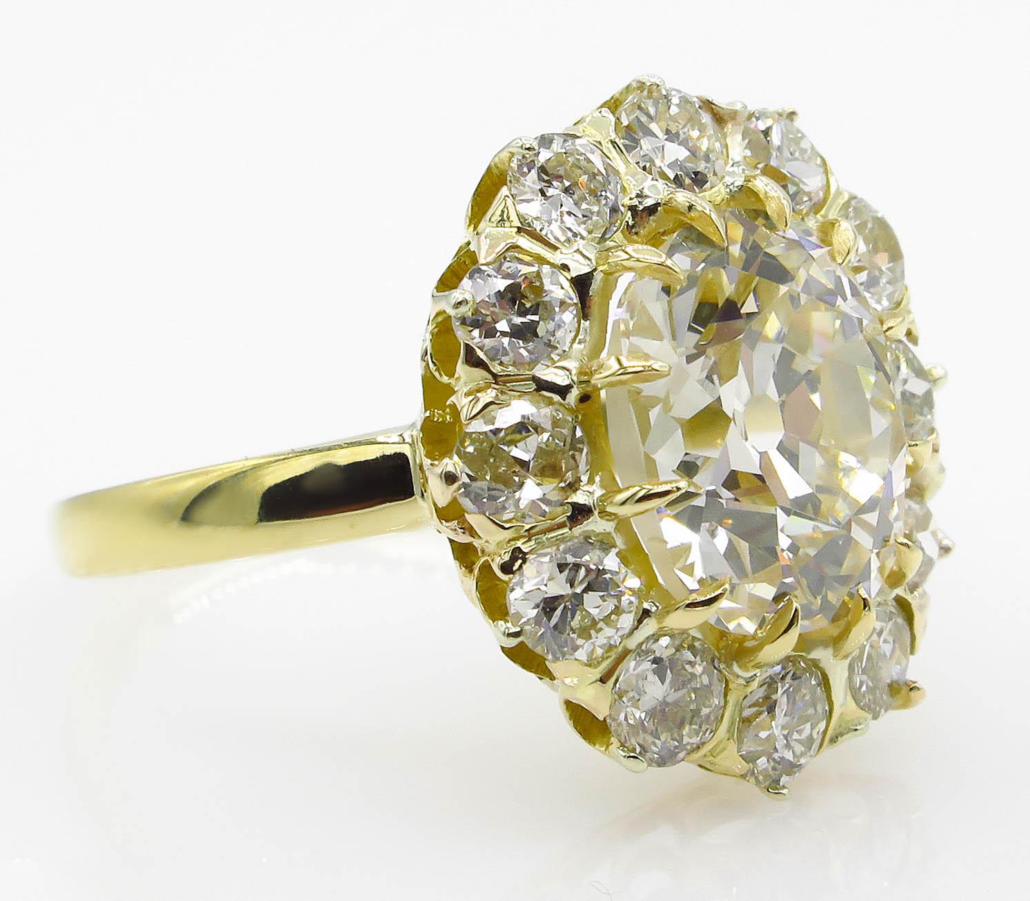 GIA 4.70 Carat Old Mine Cushion Diamond Cluster Engagement Ring In Good Condition In New York, NY