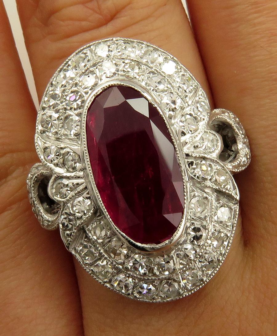 Oval Cut GIA 4.70 Carat Antique Vintage Ruby and Diamond Cluster Ring in 18 Karat Gold For Sale