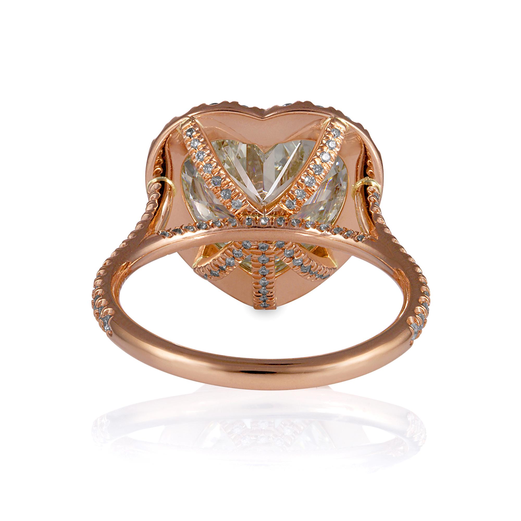rose gold heart shaped engagement ring