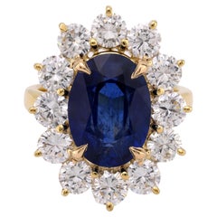 GIA 4.84 carat oval cut sapphire diamond 14k yellow gold cluster ring