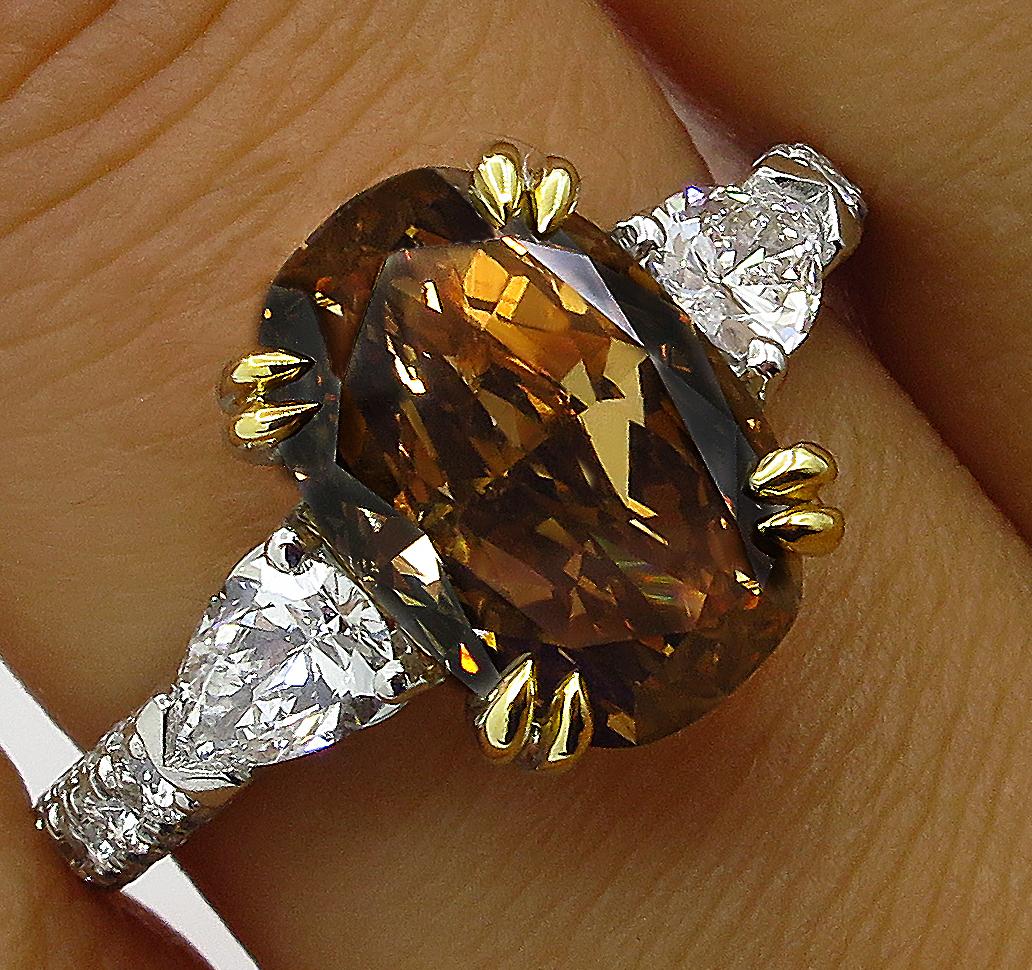 GIA 4.85 Carat Natural Fancy Brown Orange Oval Cut Diamond 3-Stone Platinum Ring 3