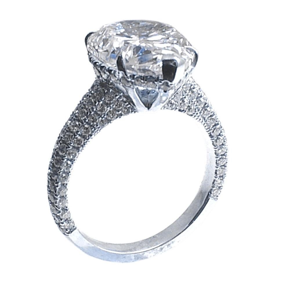 Pear Cut GIA 4.86 Carat F/SI2 Pear Shape 18 Karat Gold Pave Set Diamond Ring with Halo