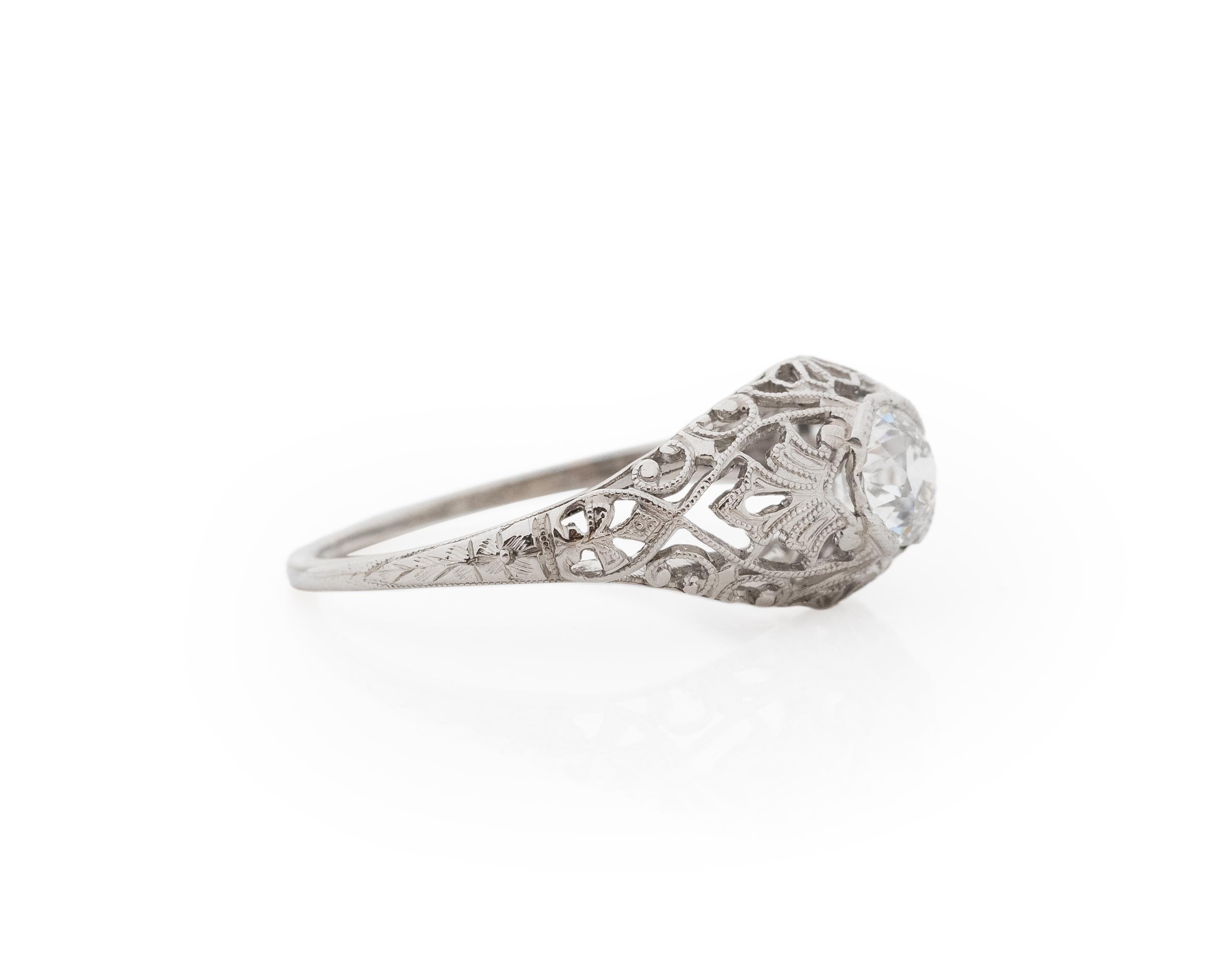Year: 1920s

Item Details:
Ring Size: 6.25
Metal Type: Platinum [Hallmarked, and Tested]
Weight: 2.9 grams

Center Diamond Details:

GIA Report#:6234087405
Weight: 49ct total weight
Cut: Old European brilliant
Color: G
Clarity: VVS2
Type: