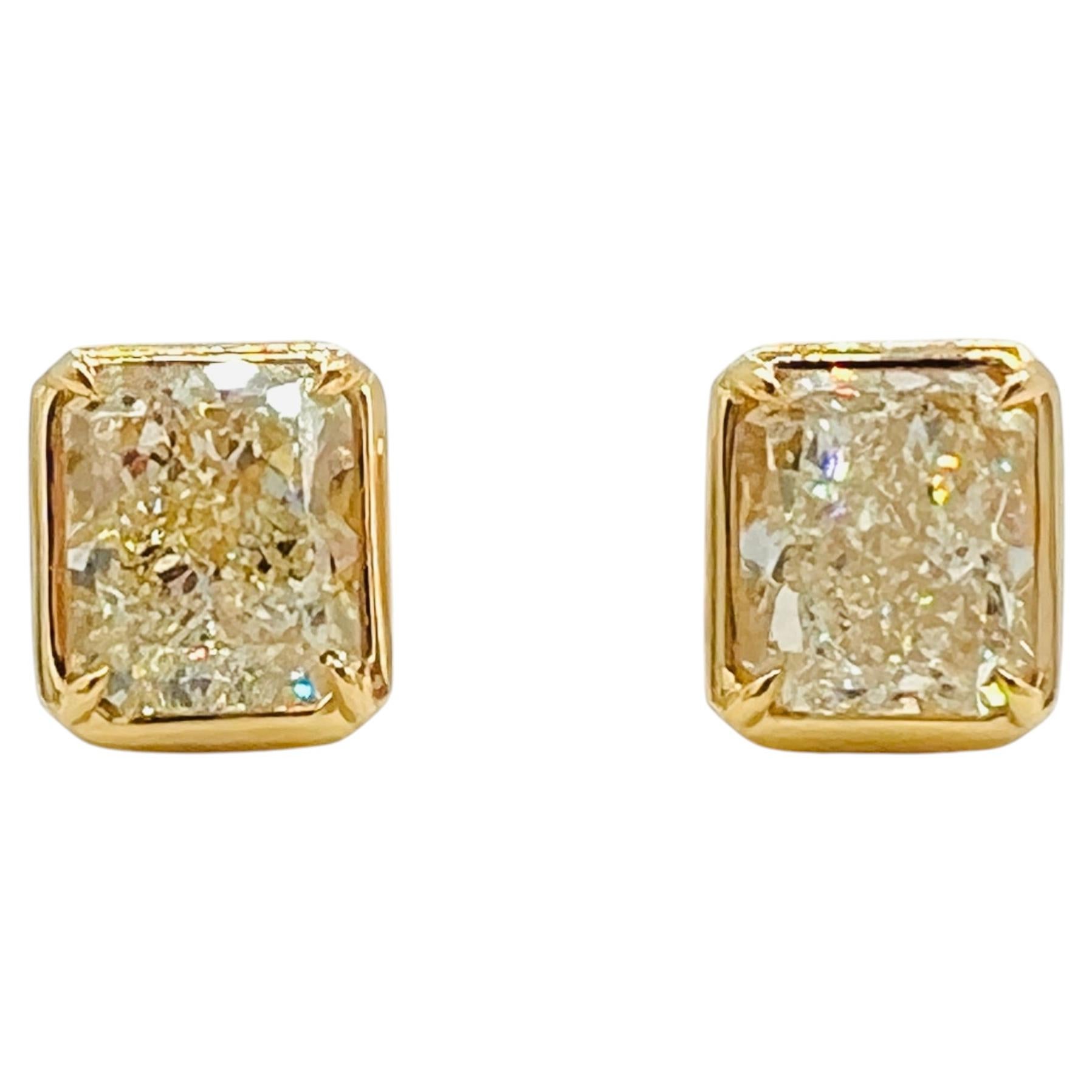 GIA 4,93 ct. Ohrstecker mit gelbem Diamanten in 18K Gelbgold
