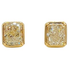 GIA 4.93 ct. Yellow Diamond Radiant Stud Earrings in 18K Yellow Gold
