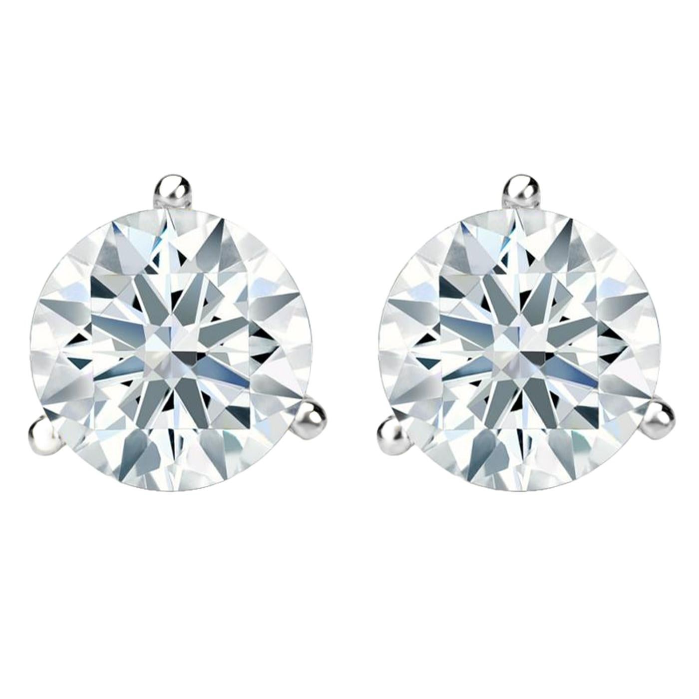 This pair of diamond stud earrings feature two round brilliant diamonds totaling 4.00ct graded by GIA-certified with J and H colors, and VS1 clarities. The perfect pair of everyday earrings mounted in a 14kt white gold 3-prong martini setting for
