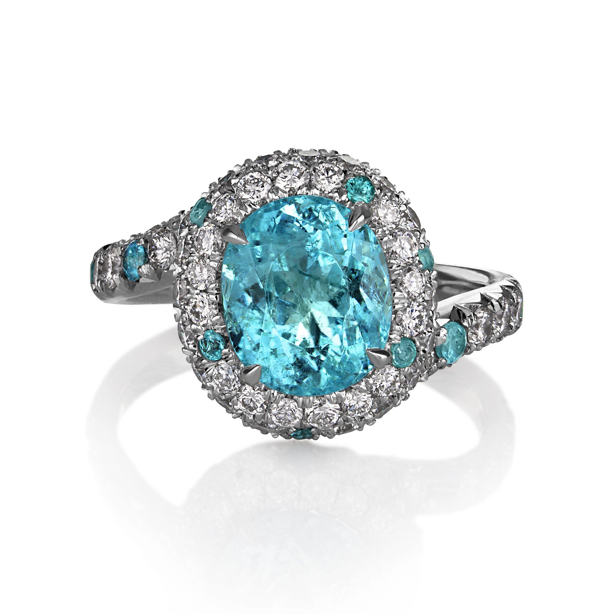 Highly collectable 4ctw Natural Paraiba Tourmaline and Diamond Platinum Ring, GIA CERTIFIED.

A high-fashion ring from another planet! This jewel will make a great addition to any GEM/jewelry collection or a perfect alternative for the Modern
