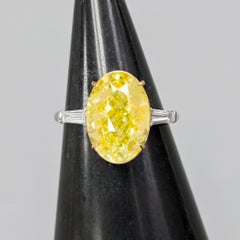 GIA 5.01 Carat Fancy Intense Yellow Diamond Ring VS2 Oval Platinum