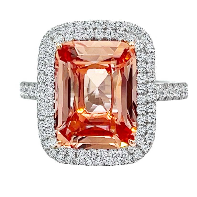 Platinum and 18k Rose Gold cocktail ring featuring a mesmerizing cushion-cut 5.01-carat pinkish orange Padparadscha sapphire, among the rarest gems on the planet. This natural GIA-certified gem is named after the color of the Lotus Blossom and its