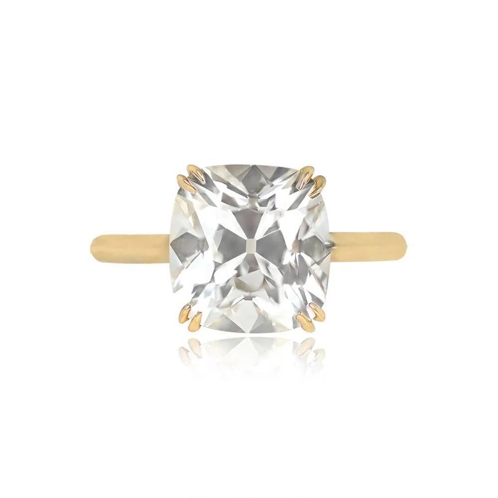 A stunning engagement ring showcasing a GIA-certified 5.01-carat antique cushion-cut diamond with L color and VVS2 clarity. The center diamond is securely prong-set with double prongs in a handcrafted 18k yellow gold setting.

Ring Size: 6 US,