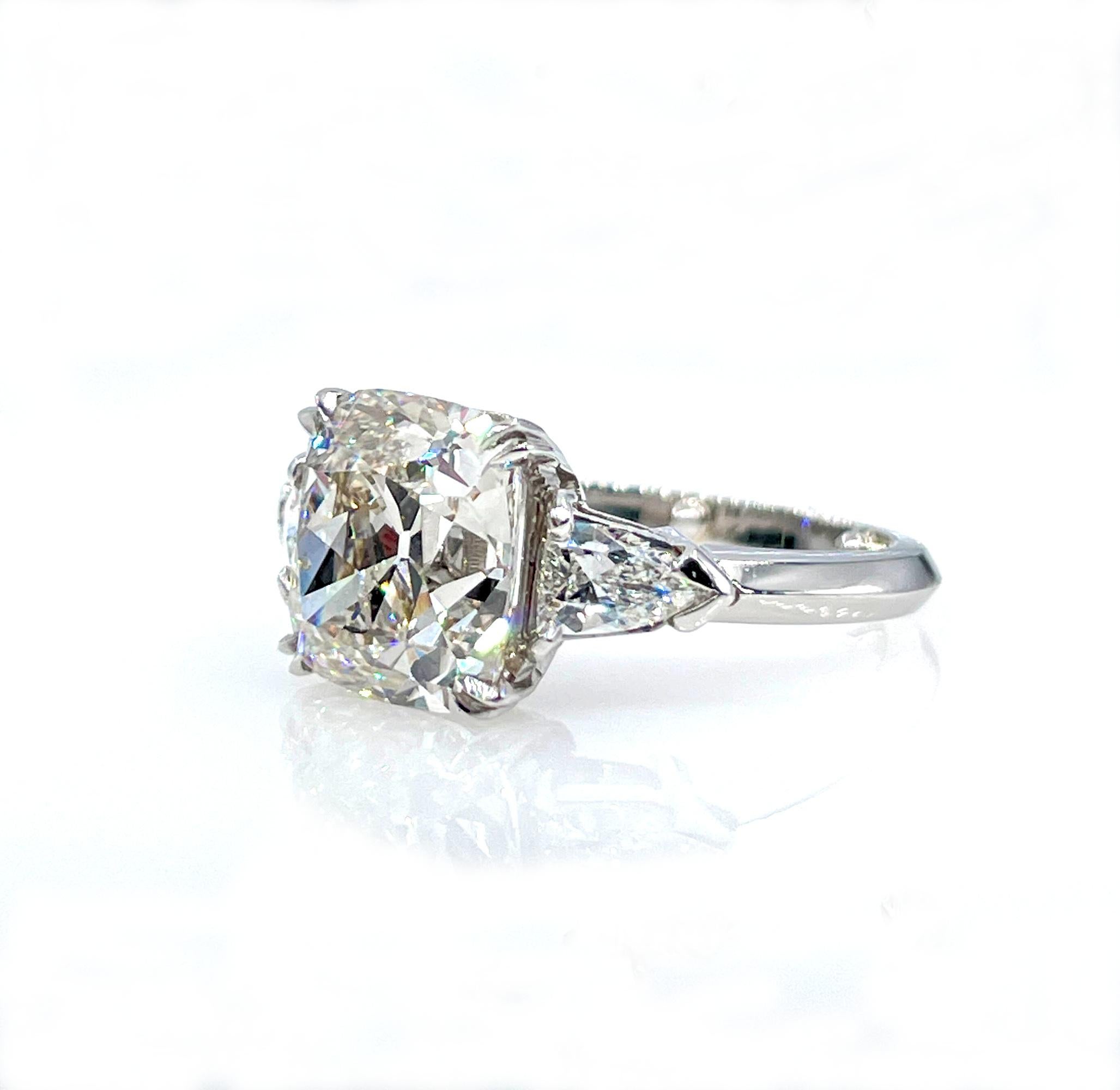 Incredible opportunity to own a Huge 100% NATURAL, NONE-treated diamond ring at the great price.
If you are looking for a SUPER Impressive Wedding Diamond Engagement Ring, it is your ring!

A large 4.34CT 100% Natural Antique Cushion Cut Center