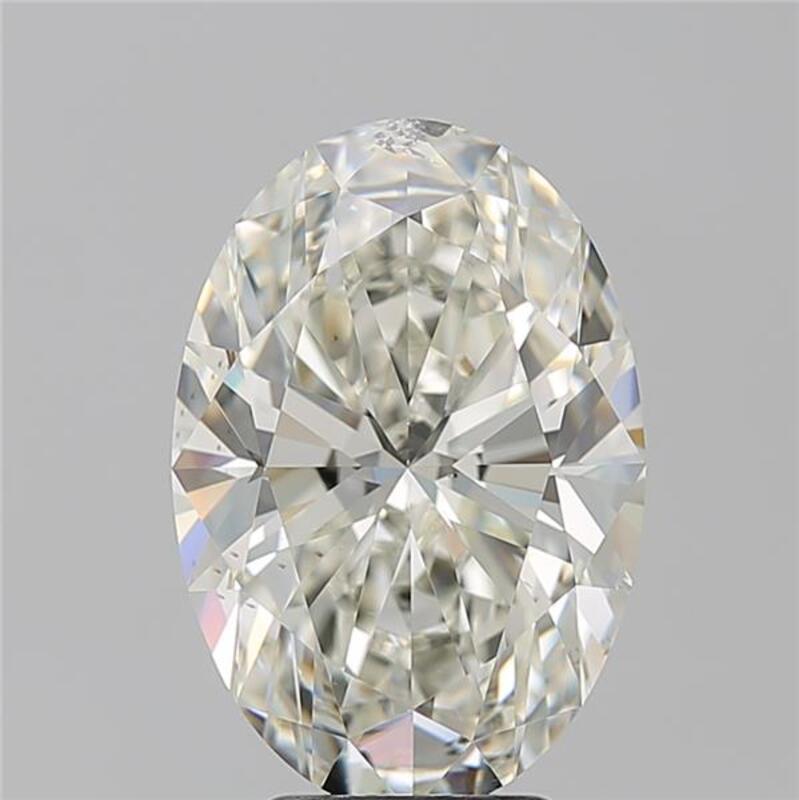 Un magnifico anello di diamanti con una splendida pietra centrale ovale, del peso di ben 5,02 e con un'impeccabile K e SI2. Questo squisito pezzo è sapientemente realizzato in oro bianco, per offrire una luce calda e radiosa che esalta la