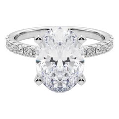 GIA 5,02ct Oval Solitär mit halber Ewigkeit 18K Weißgold Diamantring