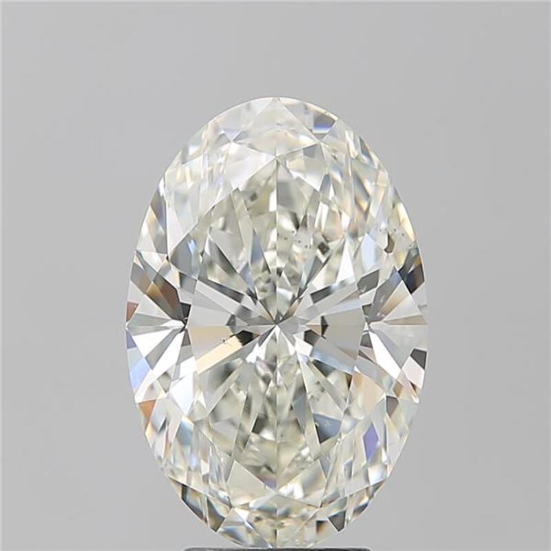 Dieser raffinierte Diamantring besticht durch einen ovalen Diamanten mit einem Gewicht von 5,03 und einem hohen K und SI1. Der mit Präzision handgefertigte Ring zeigt ein wunderschön poliertes Band aus Weißgold, das seine luxuriöse Ausstrahlung