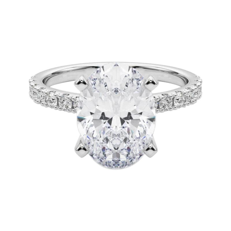 GIA 5.03ct Oval Solitaire avec Demi-Eternité Bague diamant en or blanc 18K en vente