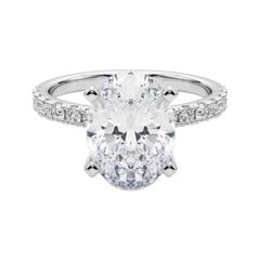 GIA 5,03ct Solitario oval con media eternidad Anillo de diamantes de oro blanco de 18 quilates