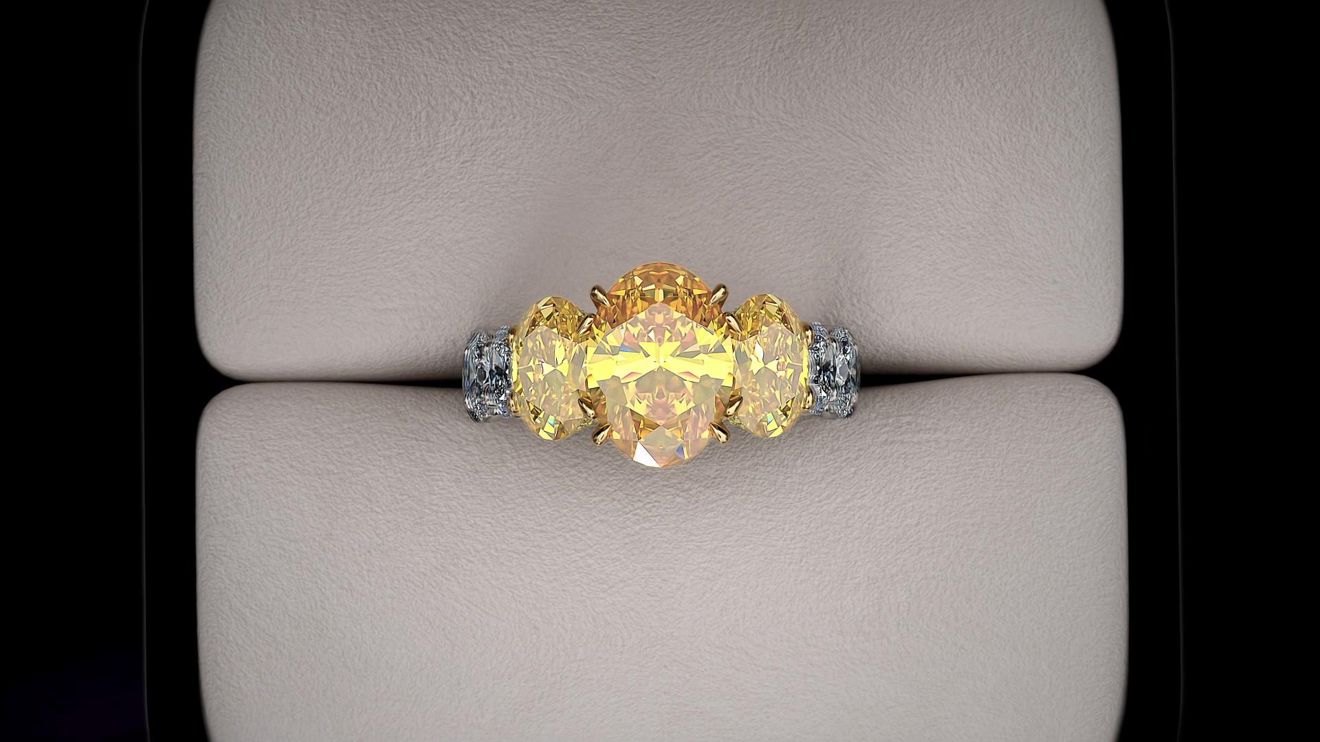 Certifié GIA, 5,11 carats de diamants ovales de couleur jaune vif intense, pureté entre VVS et VS, couleur jaune riche, pas de fluorescence, cinq diamants gradués, en or jaune 18 carats et platine, et environ 3,6 carats de diamants ovales blancs,