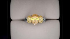 GIA 5.04 Carat Oval Yellow Intense Diamonds 18 Karat and Platinum 950 Ring