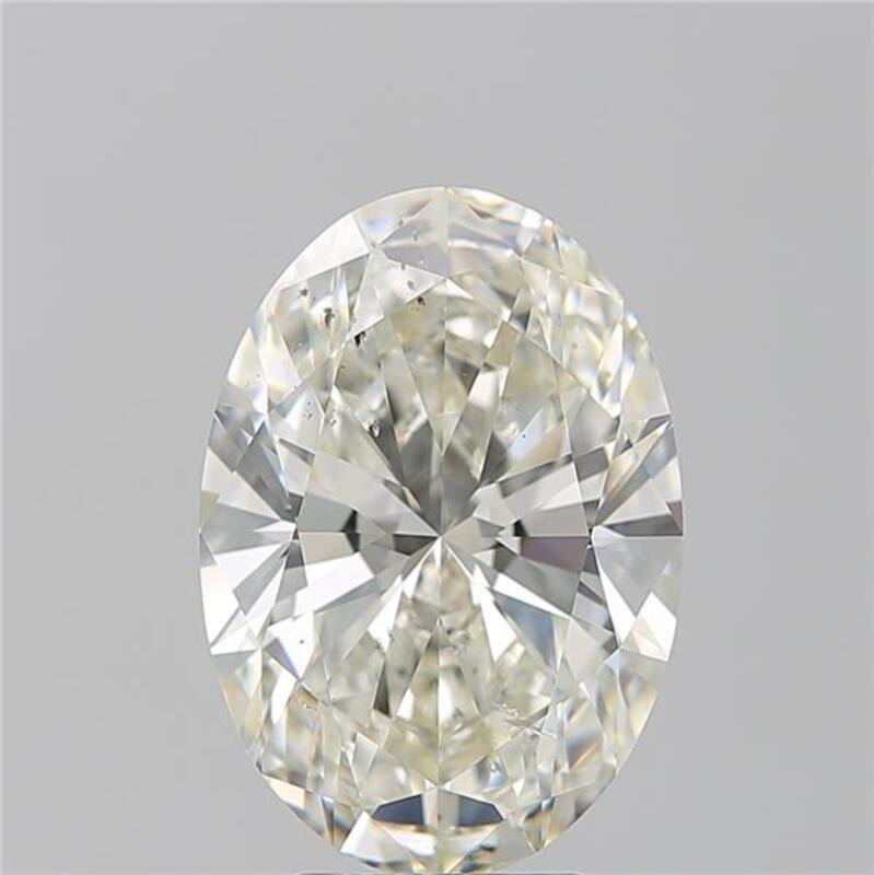 This sophisticated diamond ring features a striking centerpiece of a oval diamond, weighing 5.05 and boasting a rich K and SI2. Handcrafted with precision, the ring showcases a beautifully polished band in white gold , enhancing its luxurious