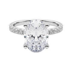 GIA 5,07ct Oval Solitär mit halber Ewigkeit 18K Weißgold Diamantring