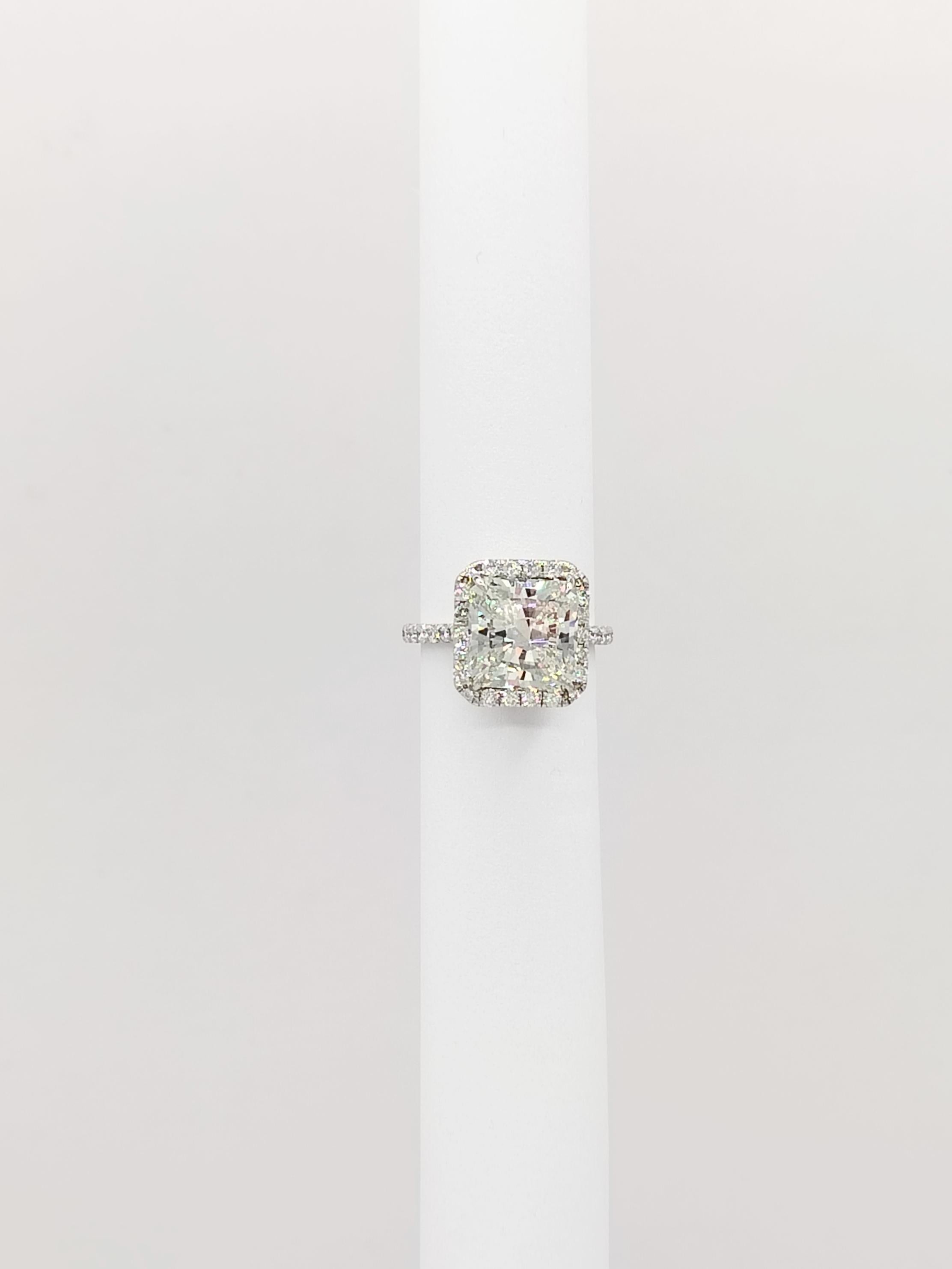 Women's or Men's GIA 5.27 ct. White Diamond Radiant Ring on 18K White Gold For Sale