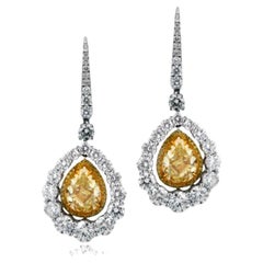Used GIA 5.35ct Pear-Shaped Yellow Diamond Earring, Diamond Halo, 18K Gold, Platinum