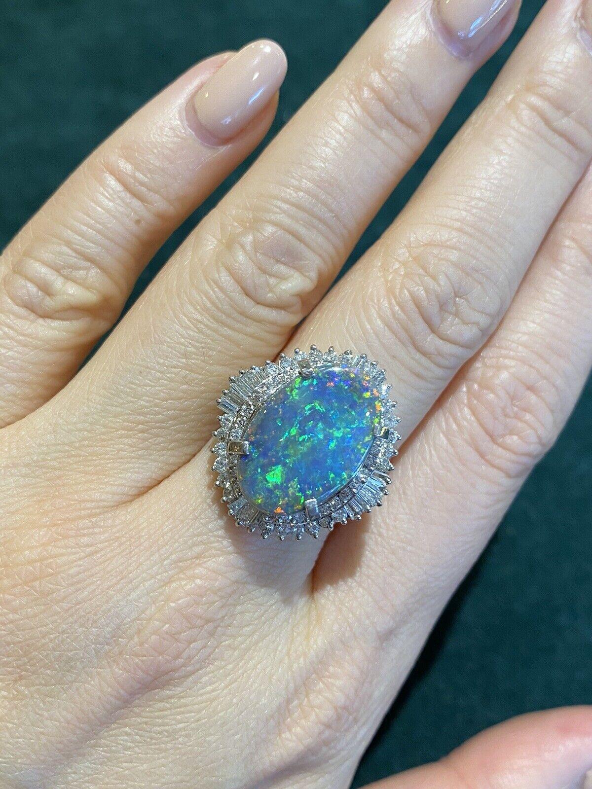 Oval Cut GIA 5.39 carats Black Opal & Diamond Ballerina Cocktail Ring in Platinum For Sale
