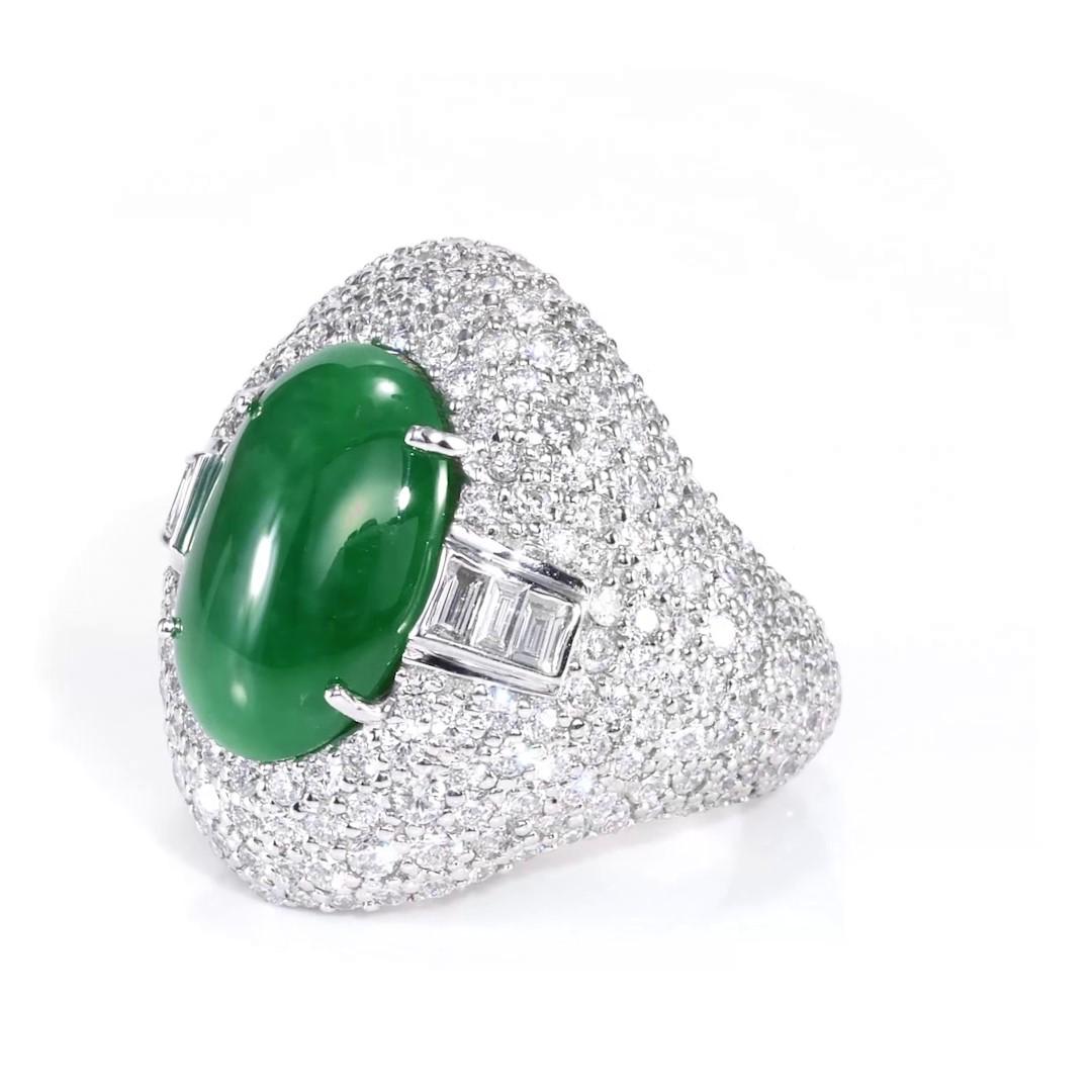 18K White Gold Ring : 10.95gm / Type A Imperial Jadeite Jade 5.41ct / Diamond 4.22ct EF Color VS Clarity / GIA #2201637800 
 Delicately mounted in 14k white gold, this 5.41ct oval cut Imperial Jadeite Jade translucency and its glinty green hue