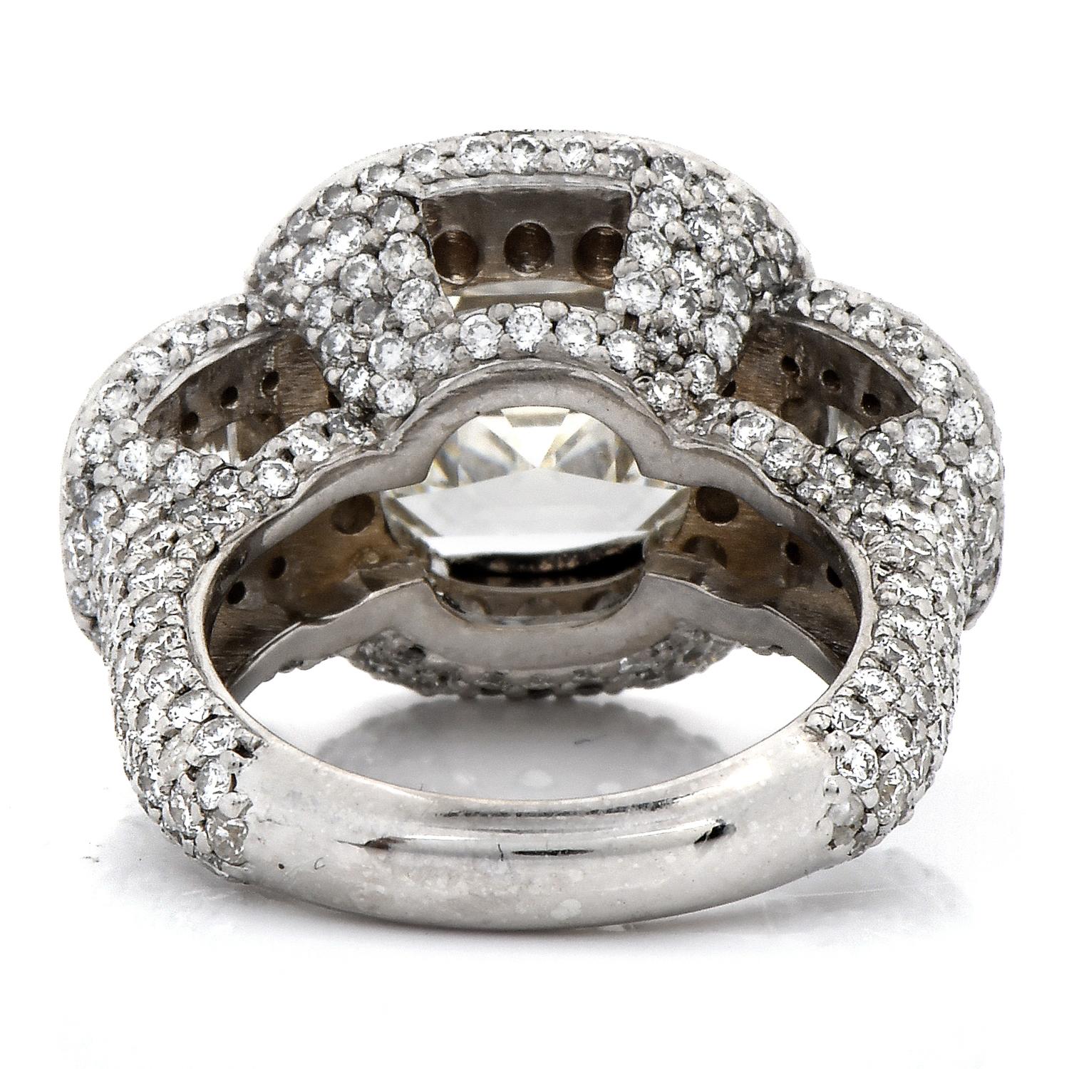 GIA 5.49ct Asscher Cut Diamond Platinum Halo Triple Stone Engagement Ring For Sale 1