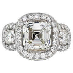 GIA 5.49ct Asscher Cut Diamond Platinum Halo Triple Stone Engagement Ring