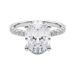 GIA 5,49 ct Solitario oval con media eternidad Anillo de diamantes de oro blanco de 18 quilates