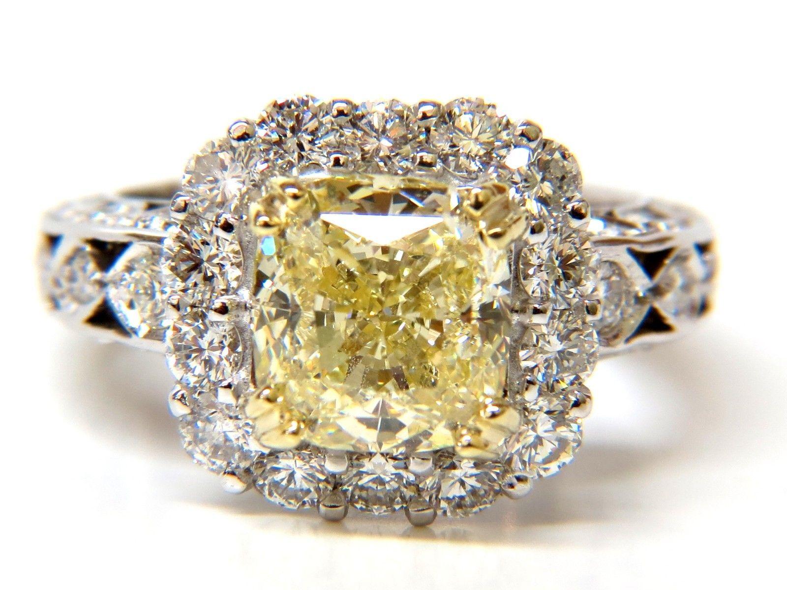 GIA 5.52 Carat Cushion Natural Fancy Yellow Diamond Cluster Halo Ring VVS1 For Sale 7