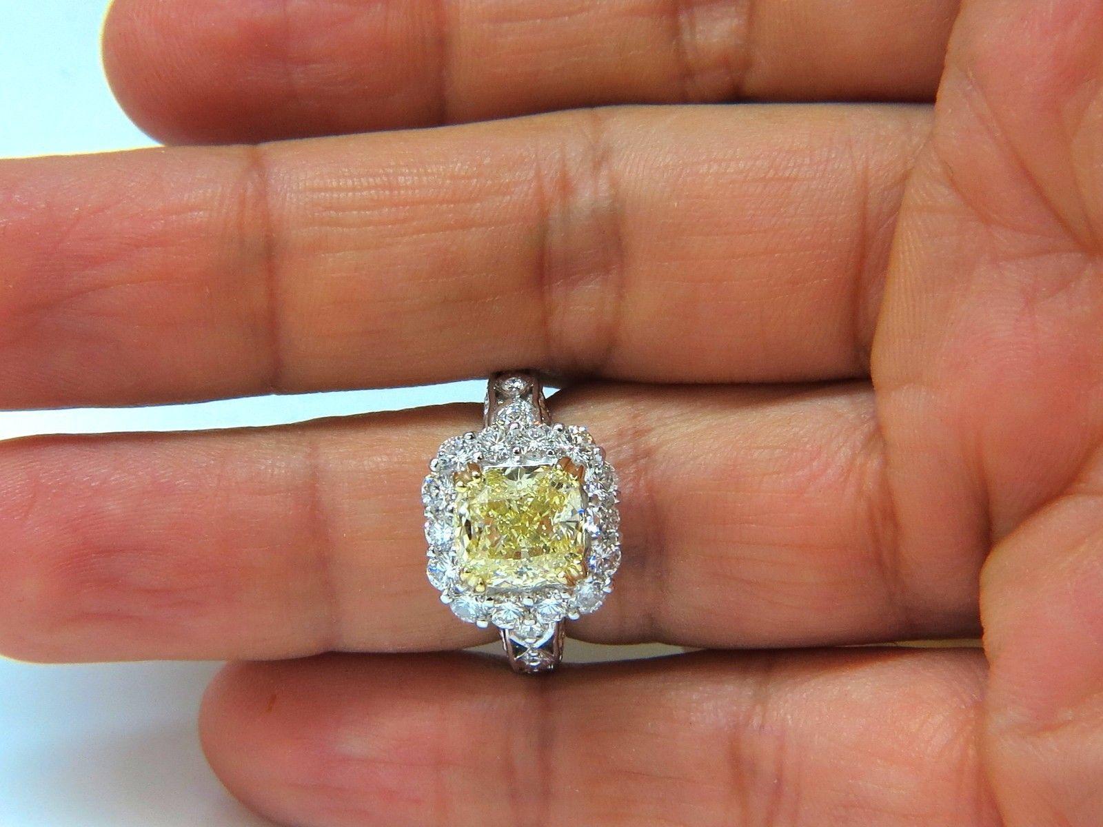 GIA Natural 3.52ct. Fancy Yellow Diamond Ring. 

Collector's requirements. 

Cushion Prime gorgeous 

Please refer to GIA copy for the diamonds specifications. 

Fancy Yellow Even 

VVS-1 Clarity 

Excellent polish 

Good Symmetry  

Fluorescence