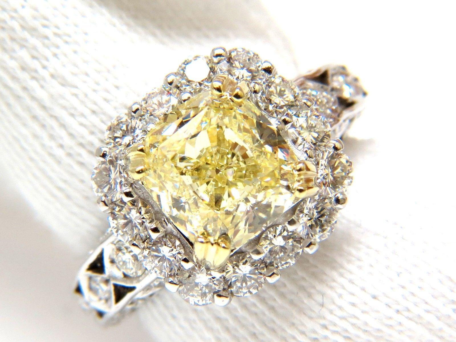 Cushion Cut GIA 5.52 Carat Cushion Natural Fancy Yellow Diamond Cluster Halo Ring VVS1 For Sale