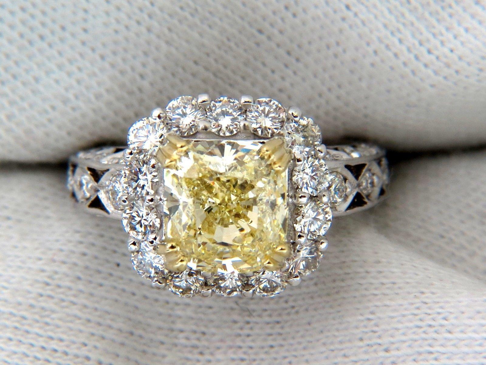 GIA 5.52 Carat Cushion Natural Fancy Yellow Diamond Cluster Halo Ring VVS1 For Sale 1