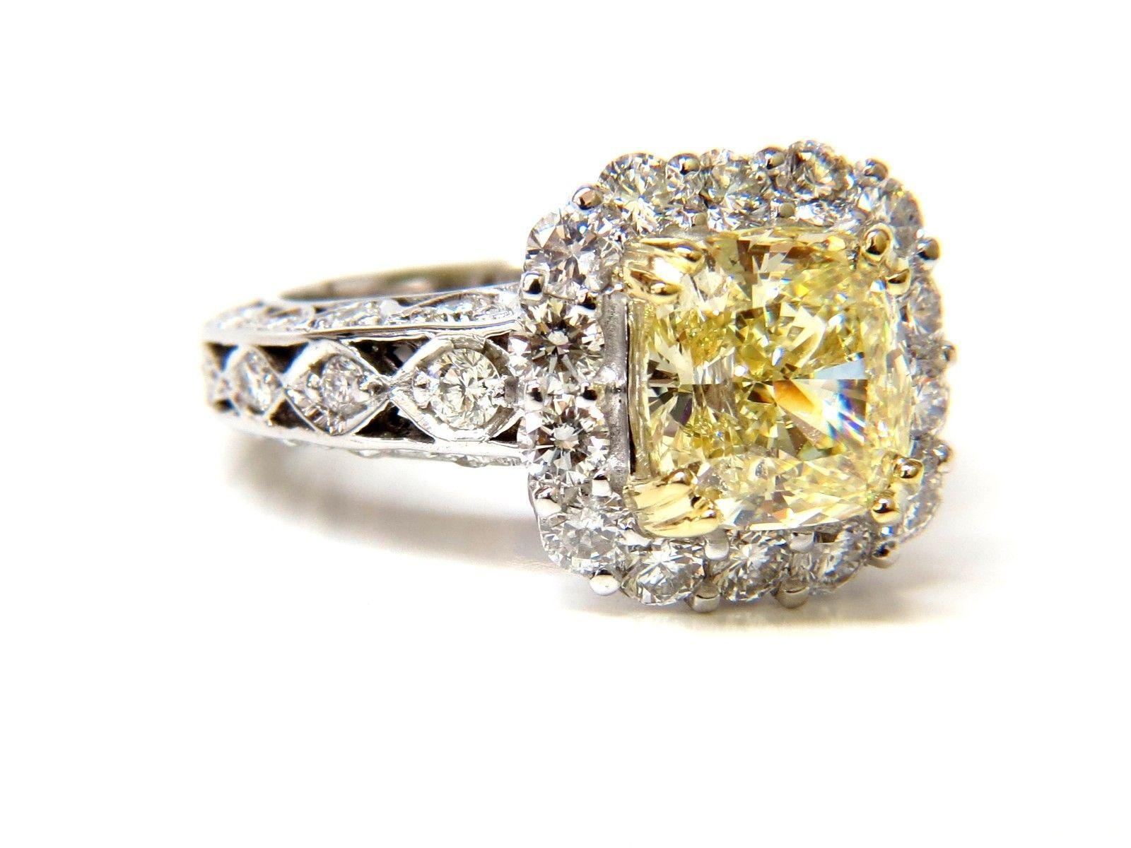 GIA 5.52 Carat Cushion Natural Fancy Yellow Diamond Cluster Halo Ring VVS1 For Sale 3