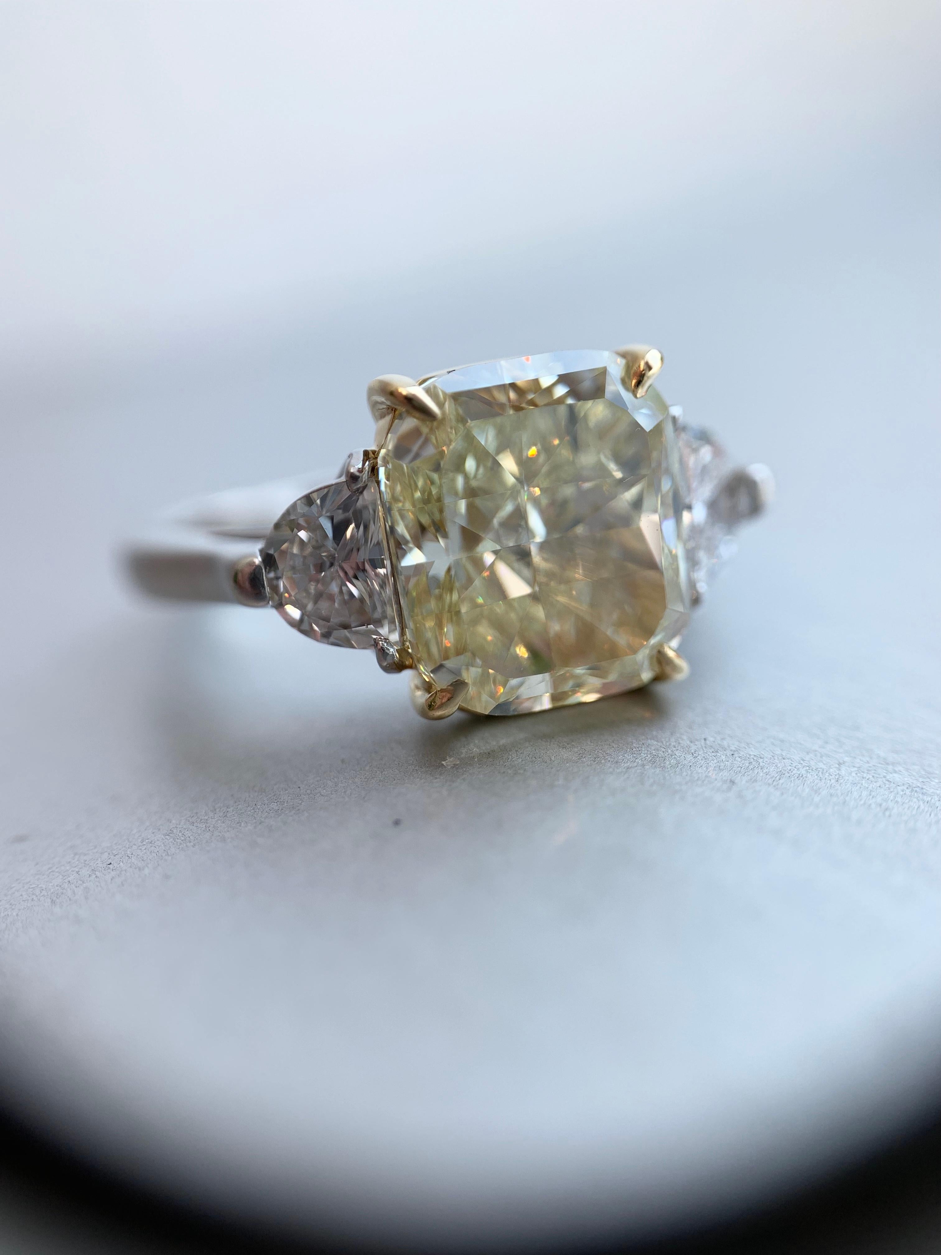 GIA 5.55 Carat Fancy Light Yellow Cushion Diamond Three-Stone Platinum Ring 6