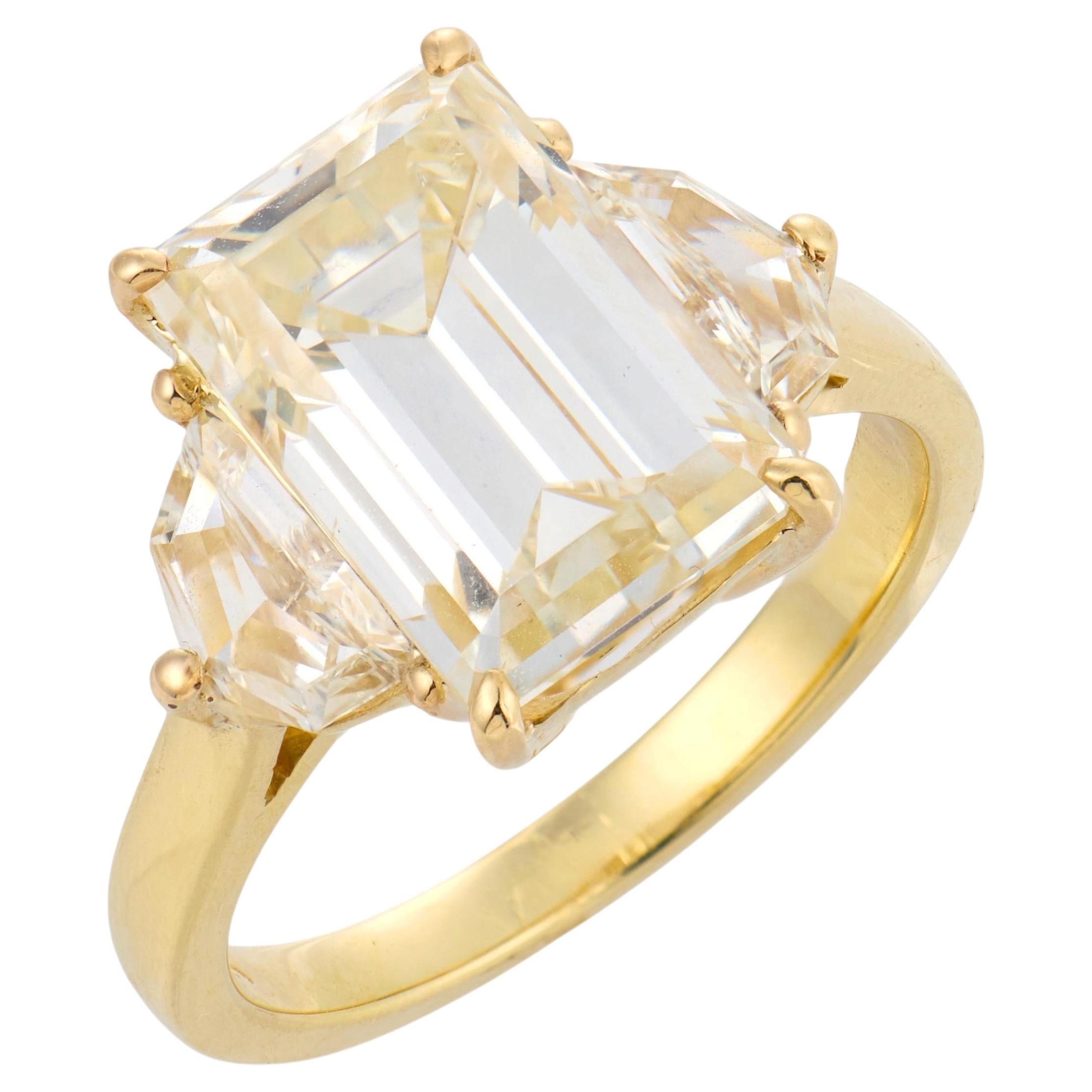 GIA 5.65 carat emerald cut diamond 18k yellow gold engagement ring