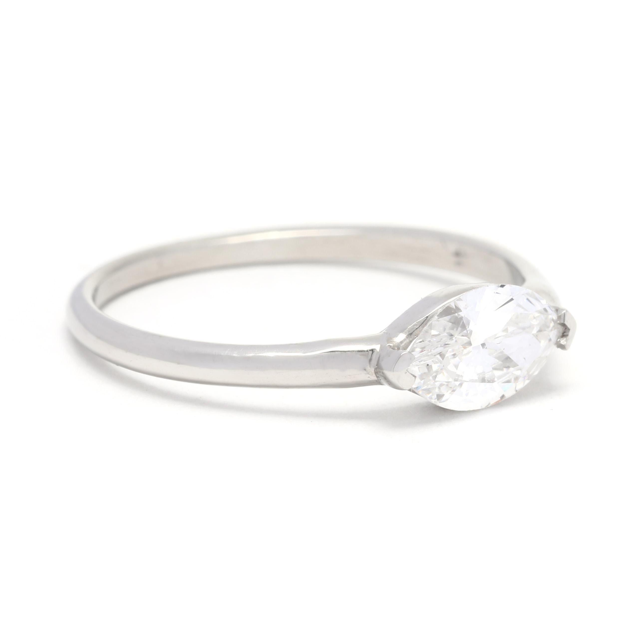 This timeless GIA certified .57ct horizontal marquise diamond engagement ring is made from luxurious platinum. Set in a marquise solitaire, this ring is the embodiment of elegance and style. This beautiful GIA certified .57ct horizontal marquise