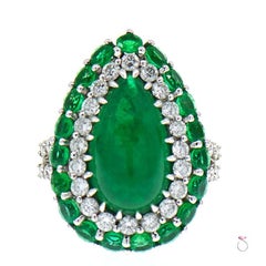 GIA 5.82 Carat Pear Shape Colombian Emerald and Diamond Double Halo Ring