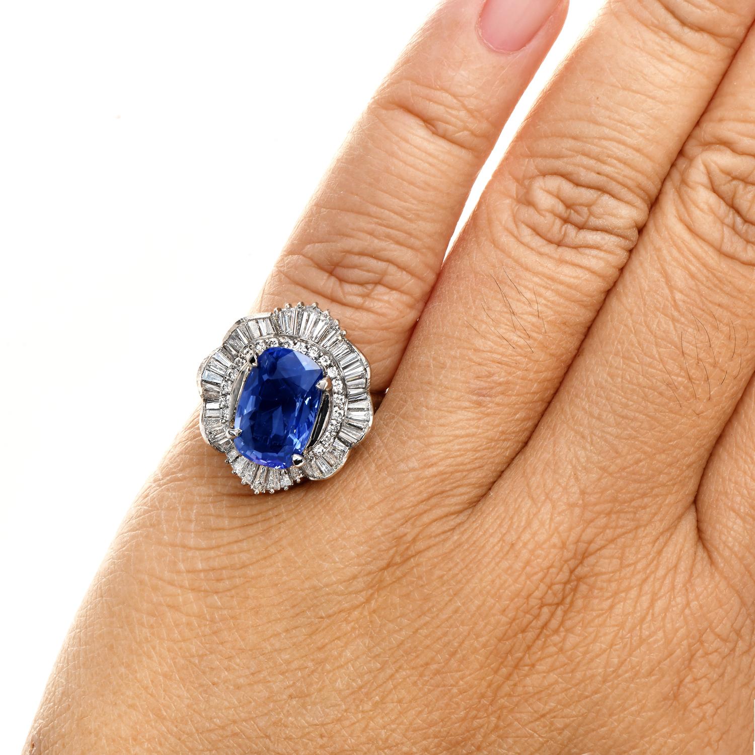 A sparkly ballerina style Blue Sri Lankan Sapphire ring can be a magnificent present or an unusual engagement ring.

Crafted in luxurious platinum, centered by a GIA-certified Blue Sapphire,  cushion cut, weighing approximately 5.87 carats, No heat