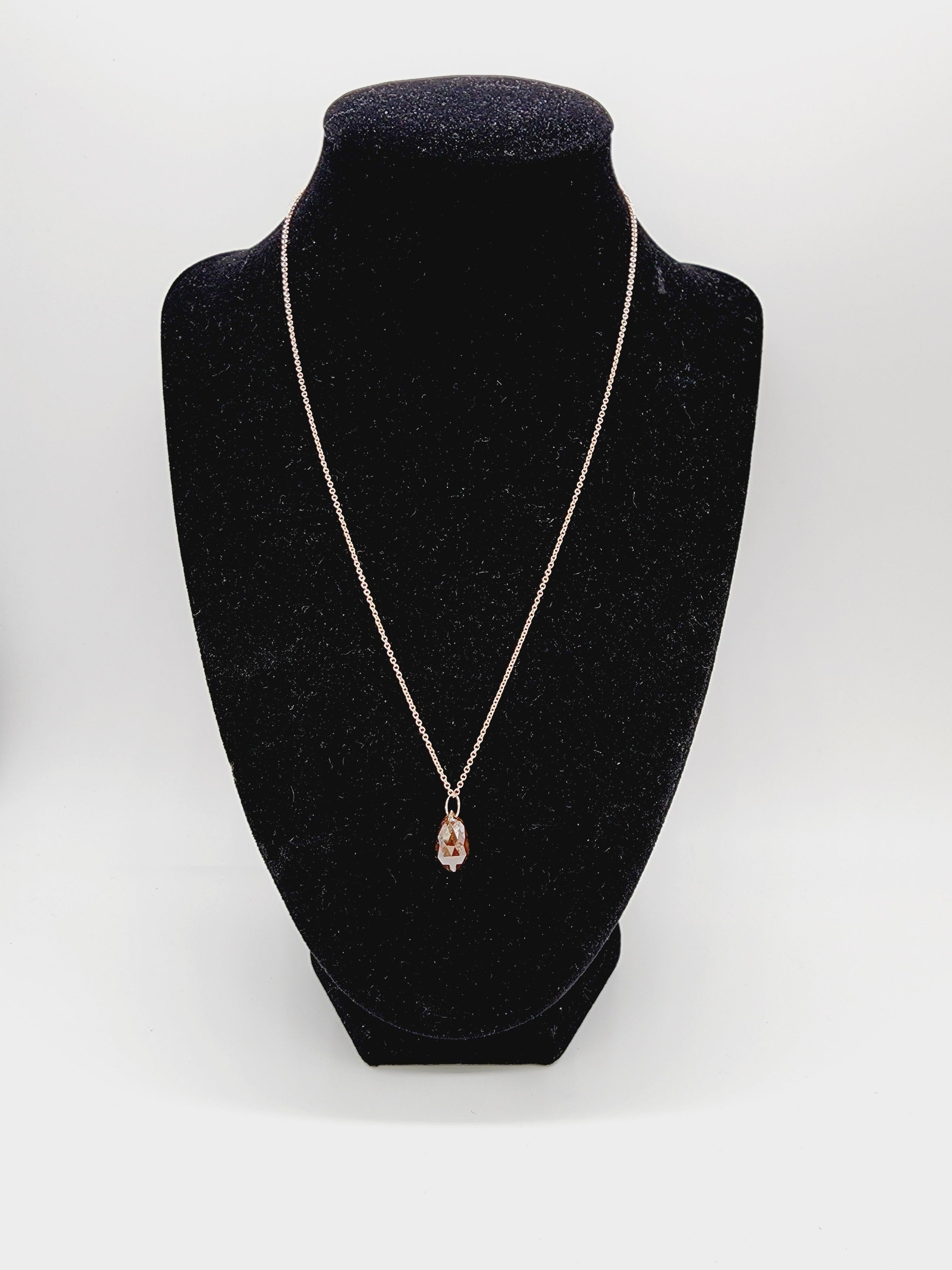 GIA 5.99 Carats Orange Brown Diamond Briolette Pendant Rose Gold 14 Karat.  Featuring a cognac-colored briolette weighing 5.99carats.
Set in 14k rose gold pendant. chain measures 18 inch. easily adjustable to 16 inch with the attached extra loop.
