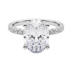 GIA 5ct Solitario ovale con mezza eternità Anello con diamanti in oro bianco 18 carati