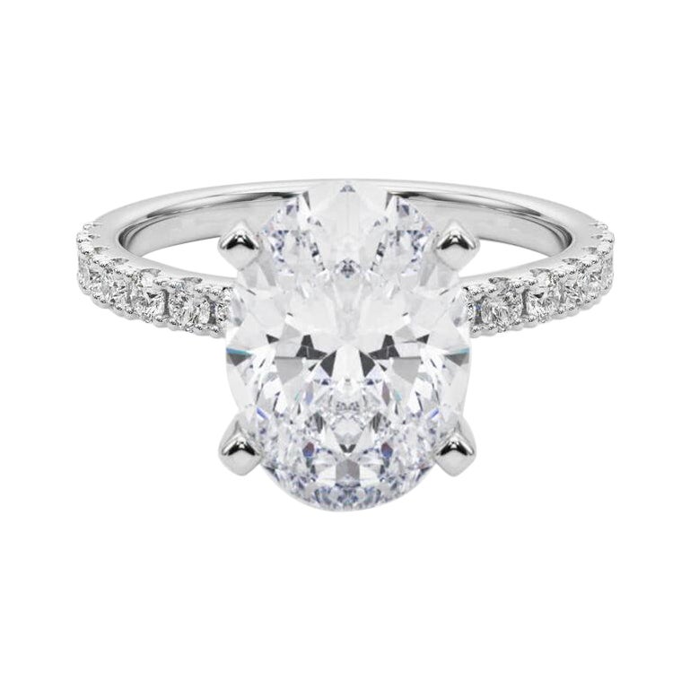 GIA 6.02ct Oval Solitaire with Half Eternity 18K White Gold Diamond Ring For Sale