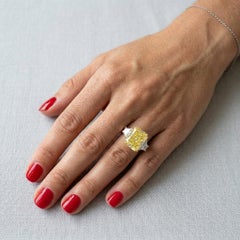GIA 6.03 CT Internally Flawless Fancy Yellow Diamond Three-Stone Ring